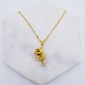 Gold rose pendant necklace